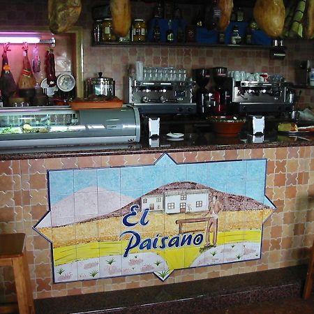 Hostal-Restaurante El Paisano Guadalema de los Quinteros ภายนอก รูปภาพ